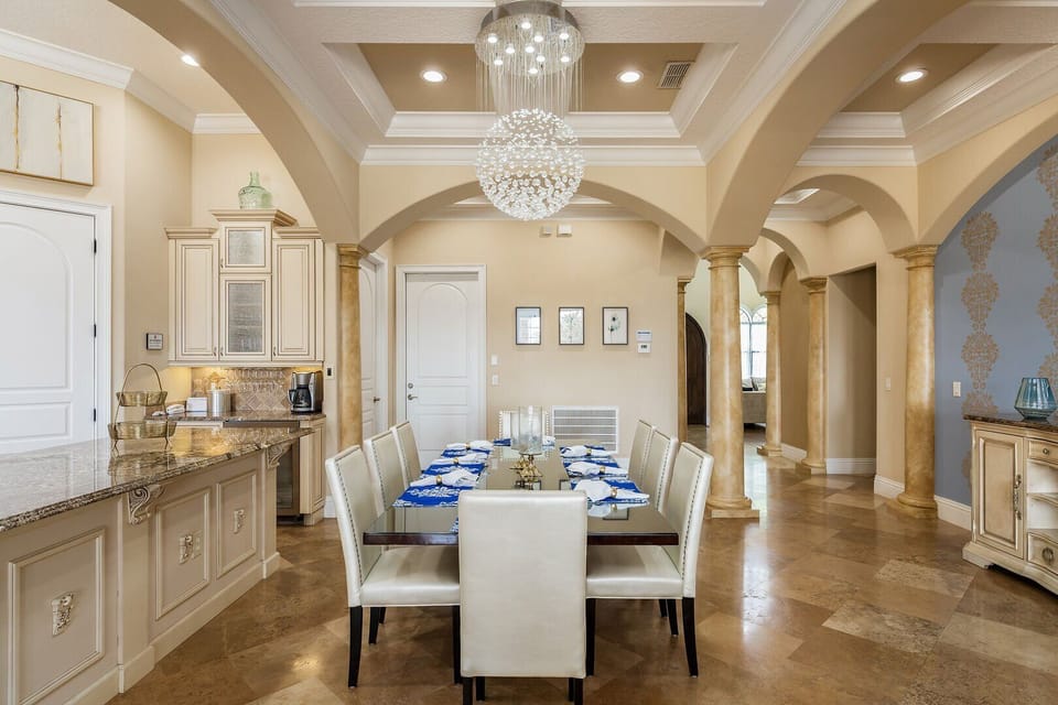 Host a family-style dinner at the formal dining table with seating for up to 8