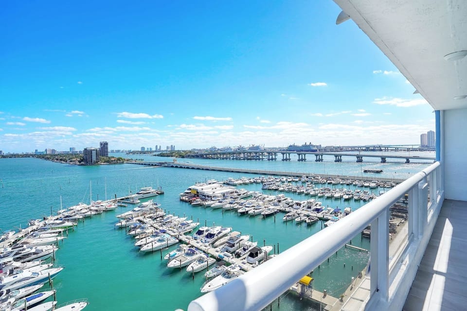 Furnished balcony w/views of Biscayne Bay, Venetian Marina and Miami Beach