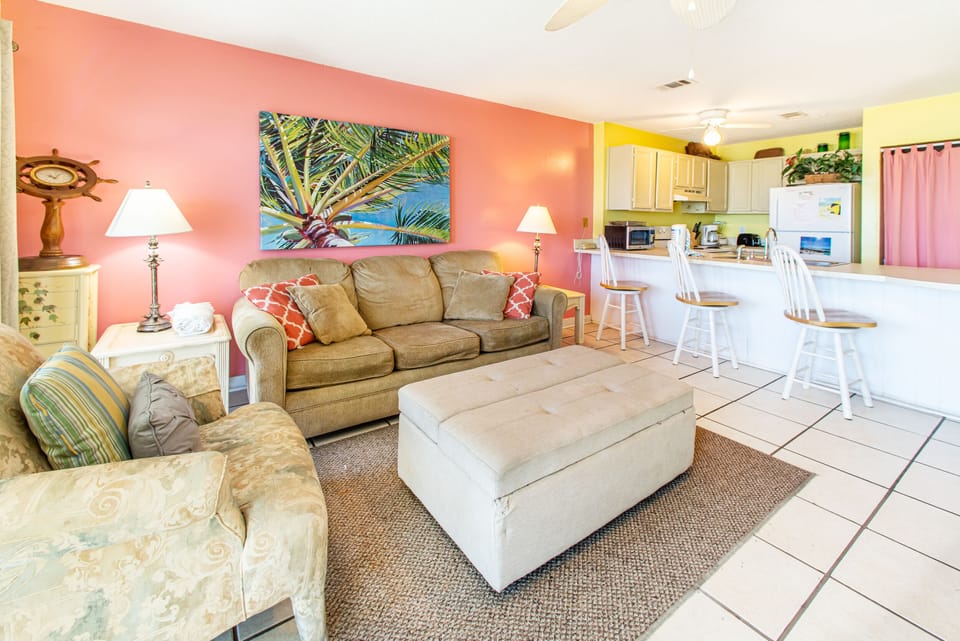 Bright & cheery living room overlooking gulf