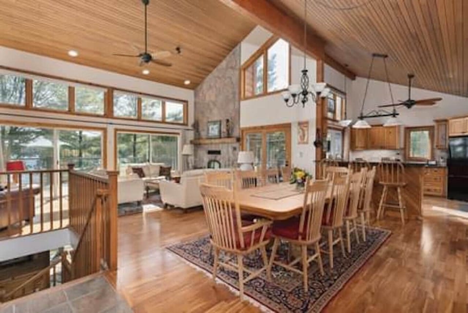 Dining room, great room and kitchen with stairs to lower level