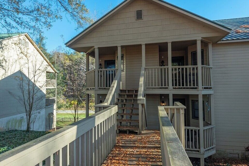 Upper-level, End unit with 8 stairs up to entry.
