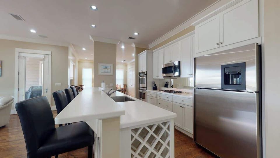 Prepare meals together in the well appointed kitchen. 