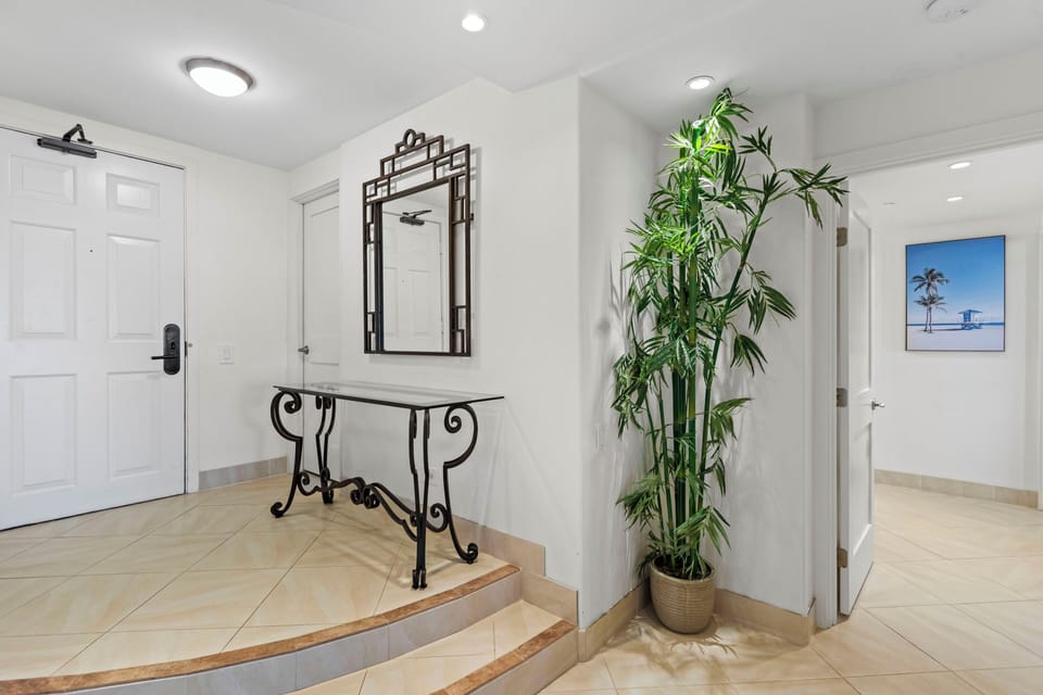 Entry with back to the living space. View of Master Suite entry. 