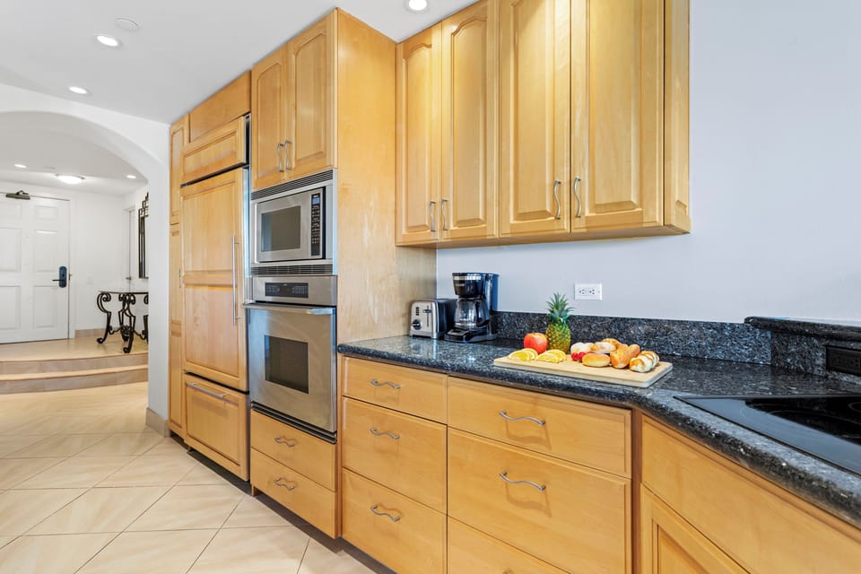 Kitchen with Entry in the distance. 