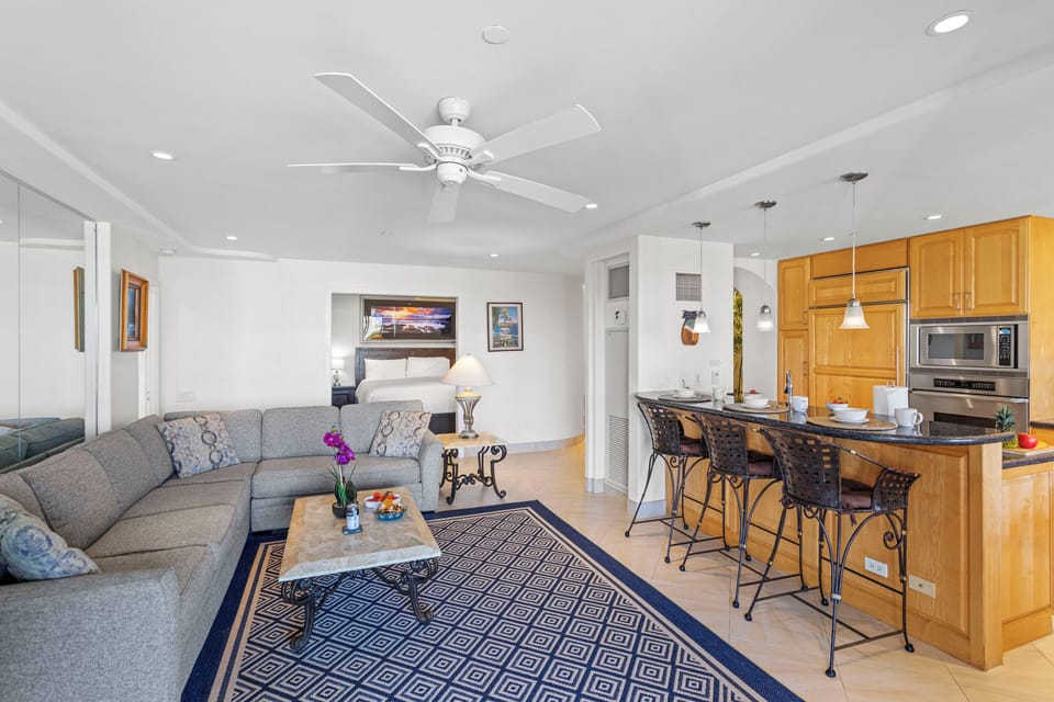 Living Space, back to the lanai. View of Den in background