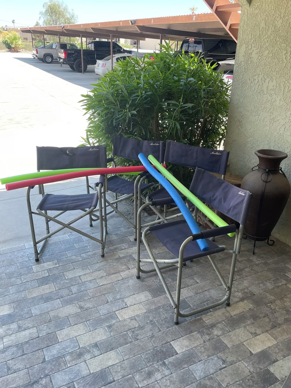Beach chairs and noodles in the laundry room