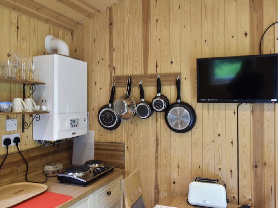 Open plan living space | Shepherds Hut 2 in Kent - The Shepherds Huts at Laddingford, Laddingford, near Maidstone