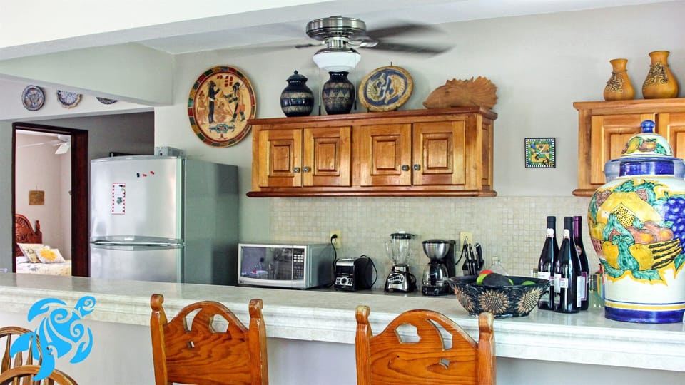 Kitchen also has a Large Sit At Bar