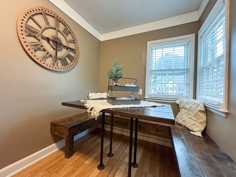 Modern and efficient—everything you need to create a delicious meal. The kitchen features a stainless steel refrigerator, stove, coffee maker, kitchenette oven, kettle, and blender