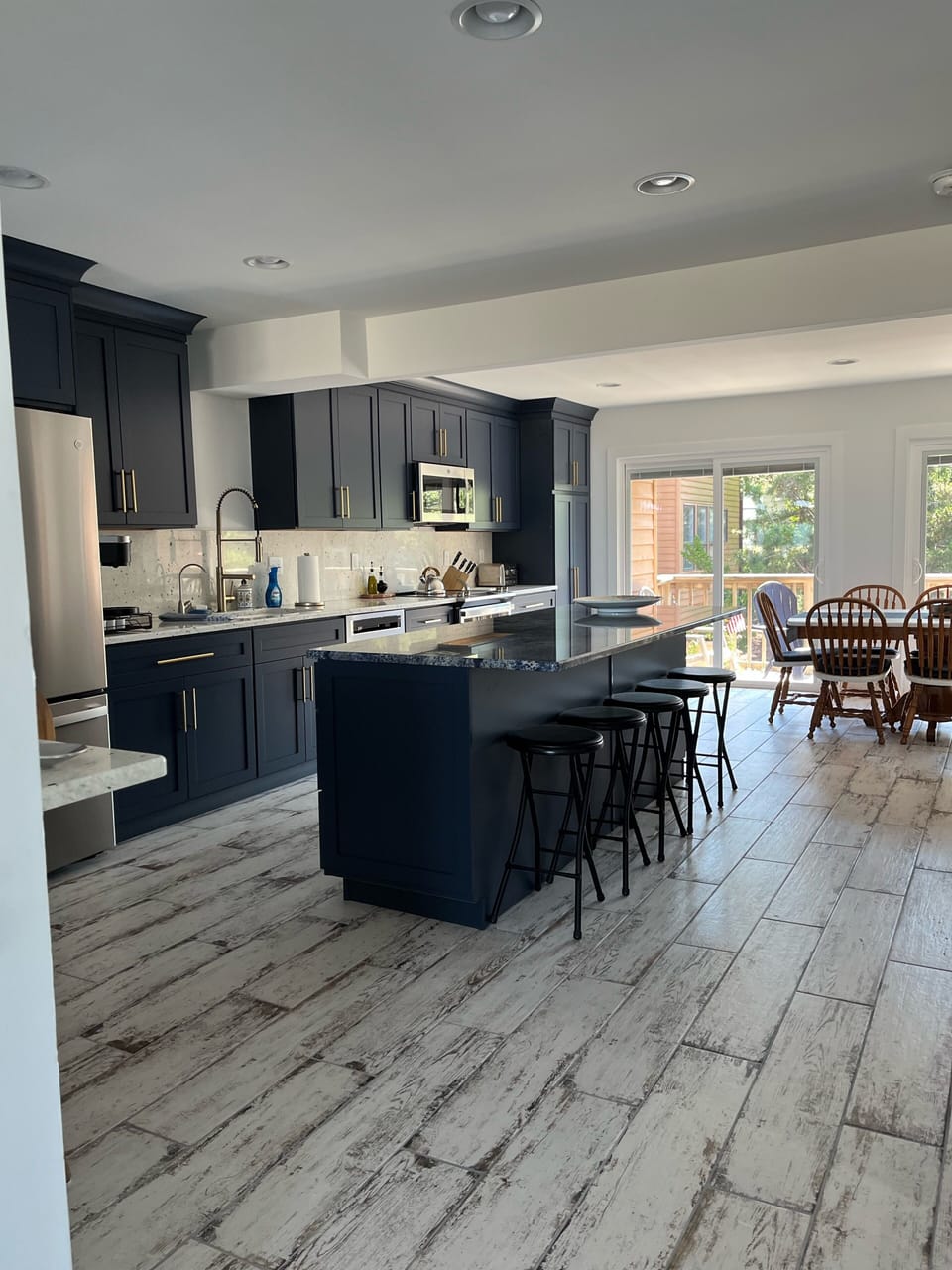 A Kitchen spacious enough for many cooks! High end appliances and fully stocked