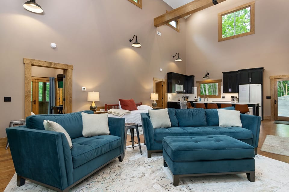 Plenty of seating near the wood stove and the HDTV.