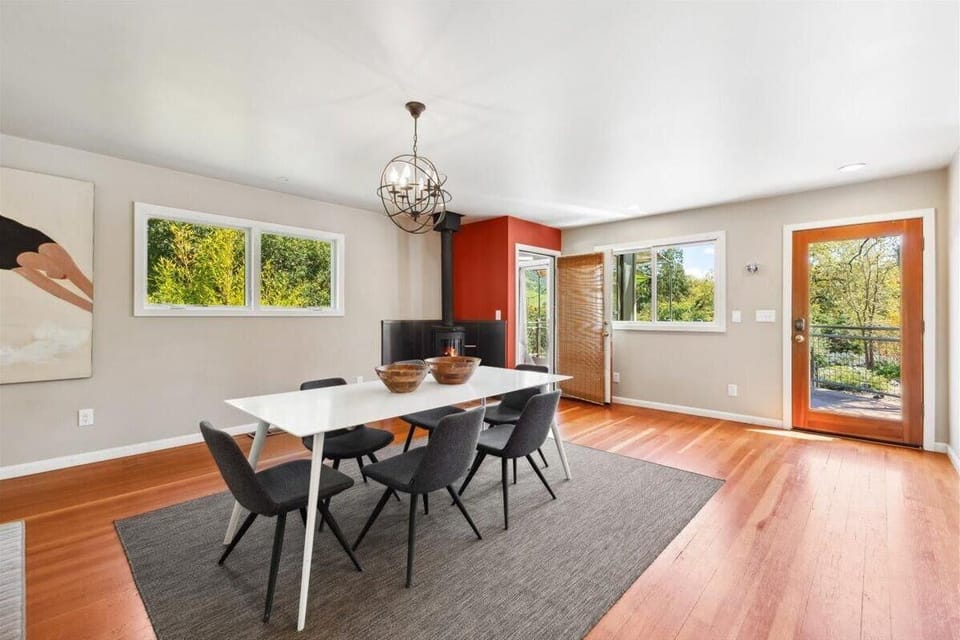 Main House - Bright dining room with garden views and natural light