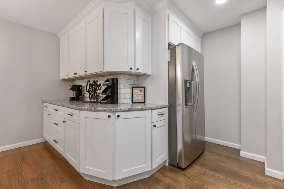 Large double door refrigerator with ice/water in door and coffee bar.