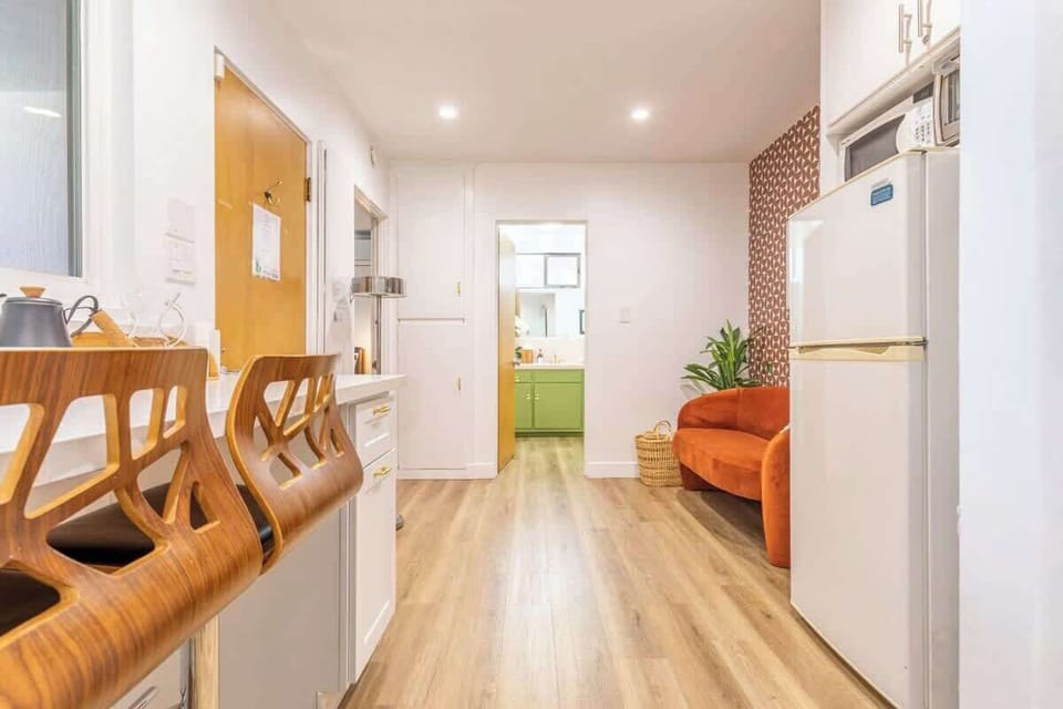 A full sized fridge is provided in the kitchen