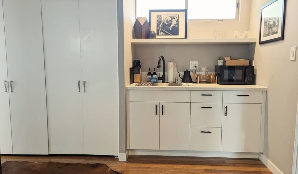 This compact kitchenette is perfect for quick meals, morning coffee, or late-night snacks during your LA stay.

