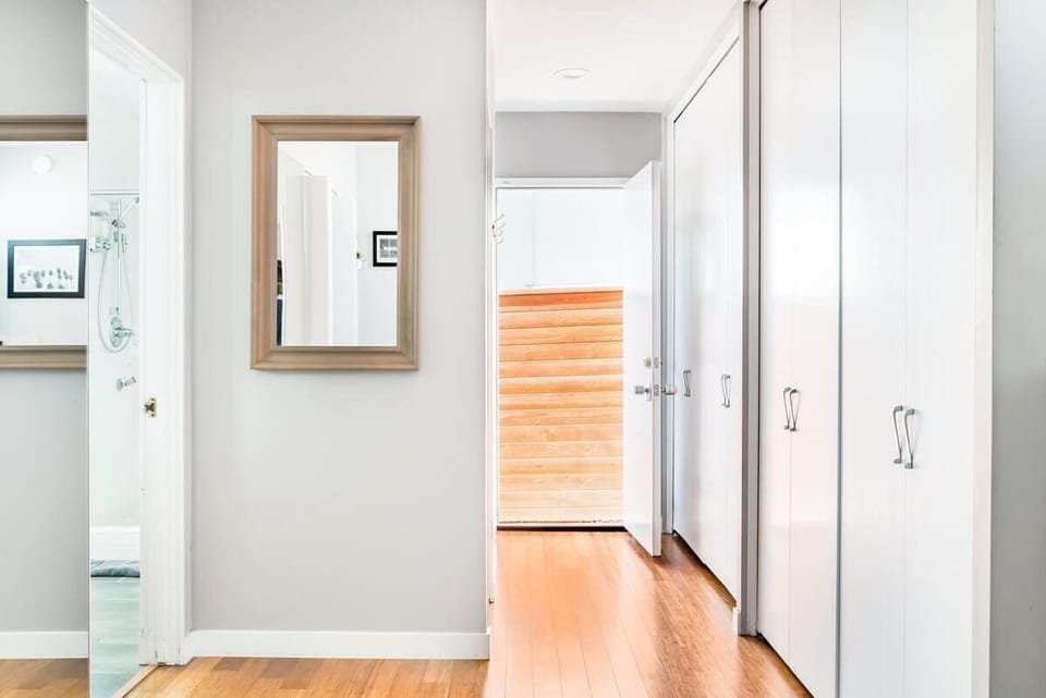 This spacious bathroom features a double vanity and soaking tub — your private oasis for relaxation and refreshment.

