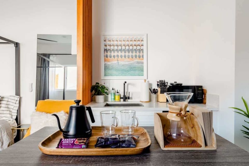 Experience the perfect blend of modern style and cozy comfort in this inviting kitchenette, designed to make you feel right at home from the moment you arrive.

