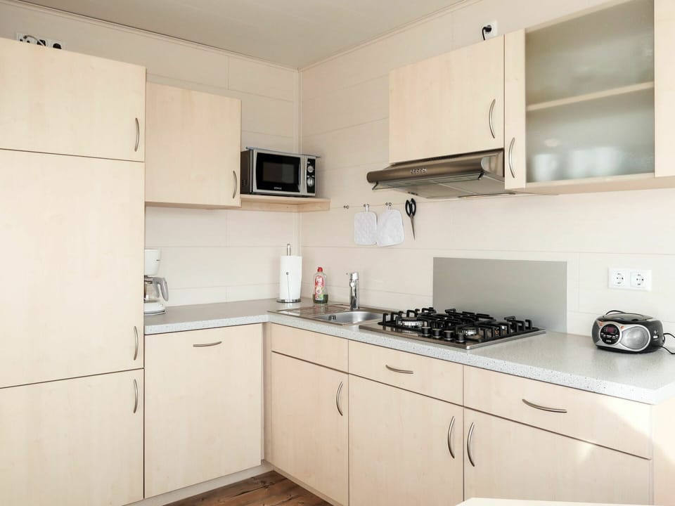 Property, Room, Kitchen, Countertop, Furniture, Cabinetry, Interior Design, Building, House, Real Estate