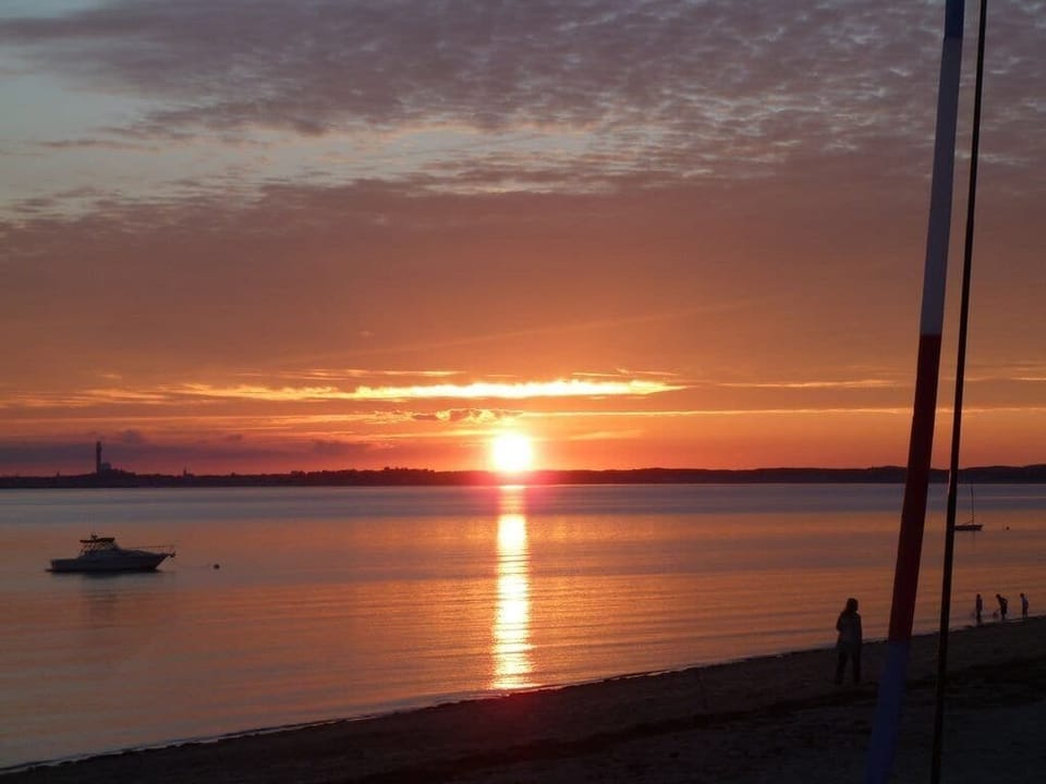 beautiful sunset seen from inside as well as on the deck.