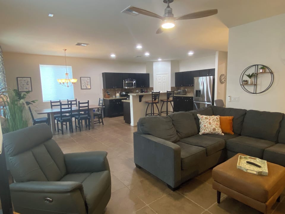 Open concept family room, kitchen, and dining area.  