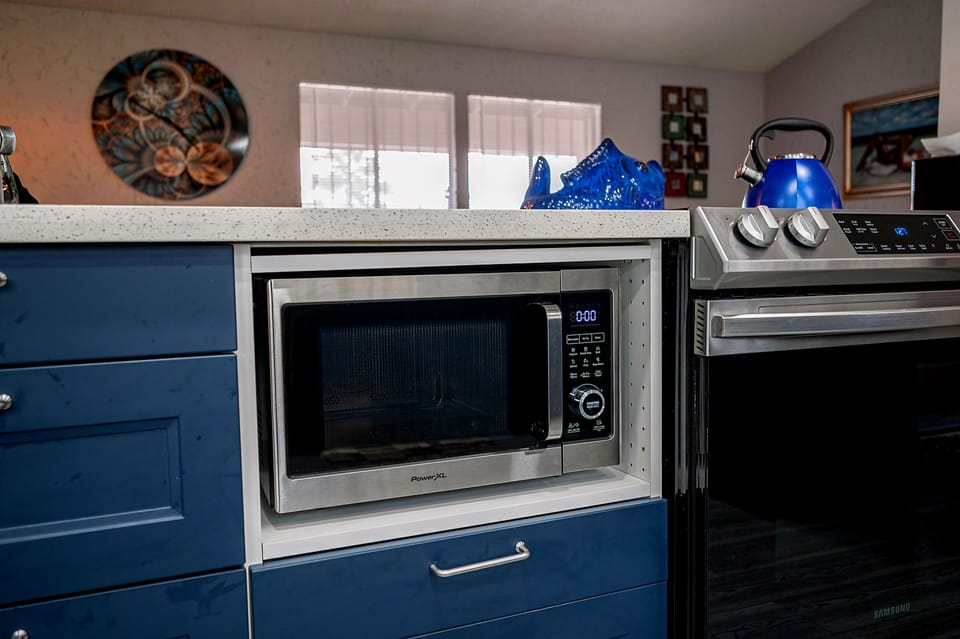 There's 2 air fryers, one in the convection microwave, also in the stove 