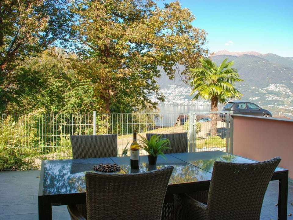 Sky, Plant, Property, Table, Furniture, Building, Nature, Shade, Chair, Outdoor Furniture