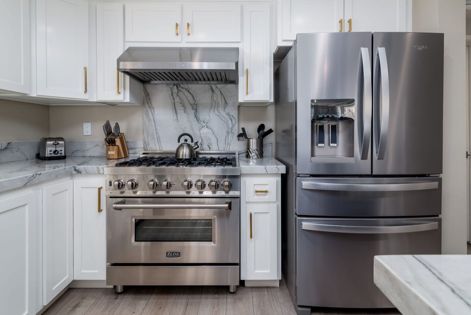Love to cook? We have a 36" oven and six burner stove
