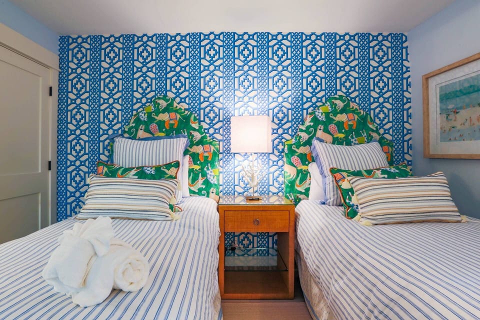 This guest suite features two twin beds.