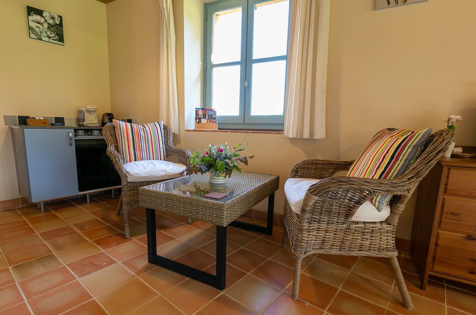 Bedroom 3 has a seating area, TV, fridge, tea & coffee making facilities