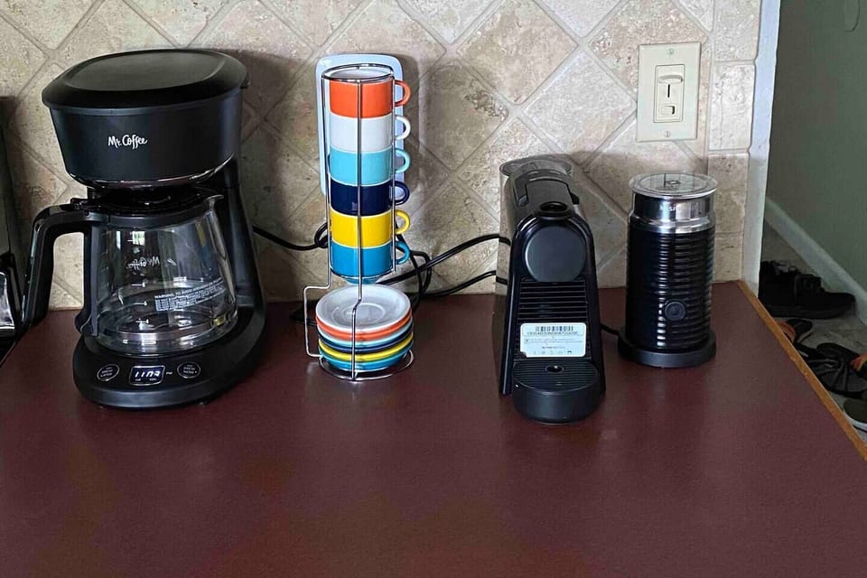 Enjoy the Complimentary Coffee Bar with a Nespresso Machine!
