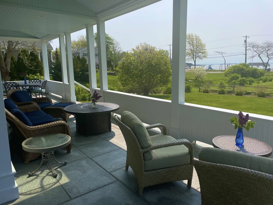 Large wrap around porch with great views and plenty of seating.