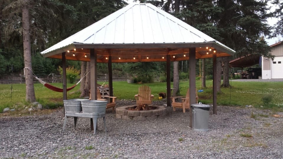 Covered firepit to enjoy your favorite beverage after landing the big one!