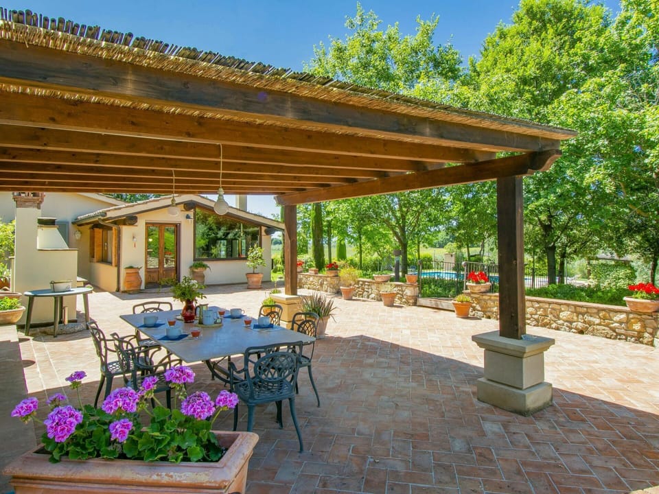 Plant, Table, Property, Furniture, Flower, Building, Flowerpot, Shade, Outdoor Table, Outdoor Furniture