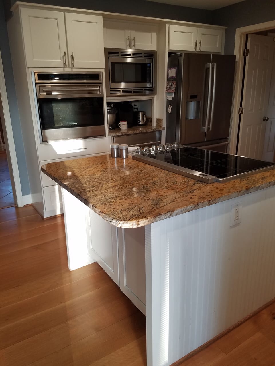 Granite counters, wide plank quartersawn white oak floors. Viking warming drawer