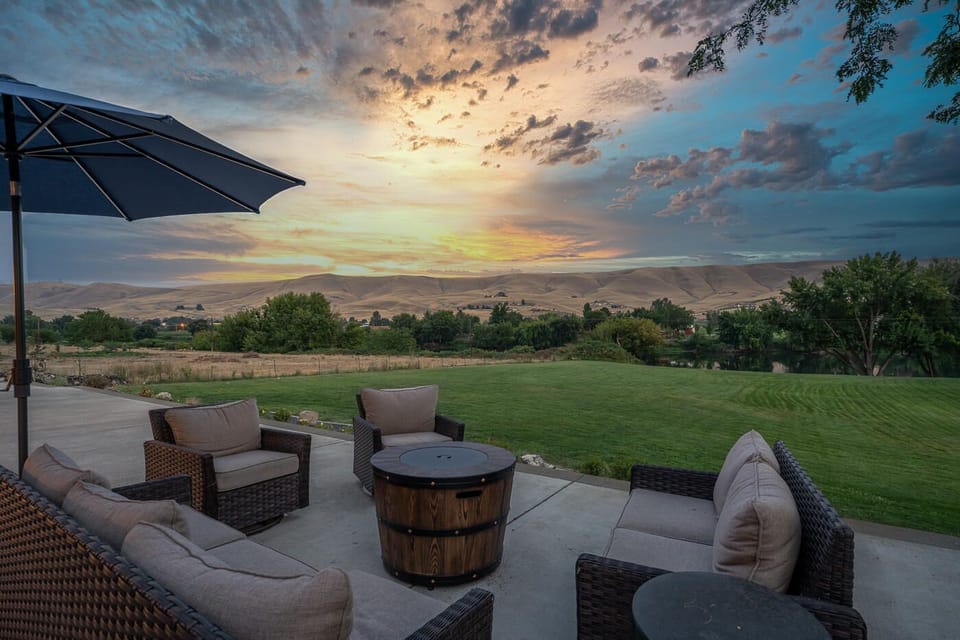 Enjoy a cozy fire by the moon light overlooking the river and beyond 
