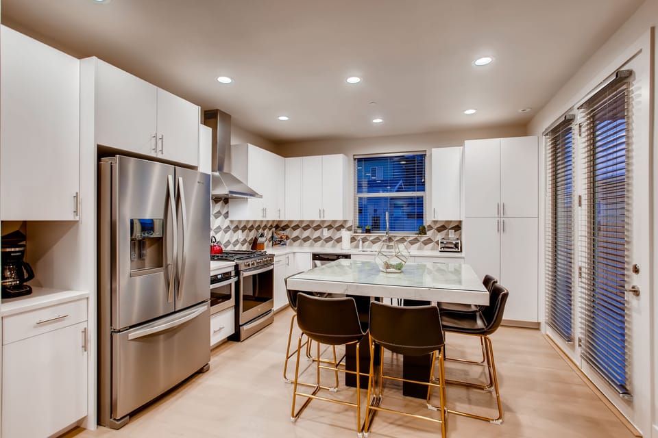 Fully Stocked Kitchen with Island for Dining