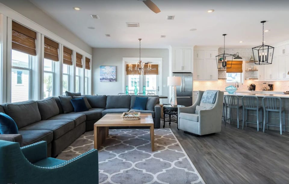 Open living, dining and kitchen area with sweeping views.