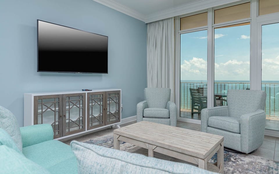 Unwind in on the sofa with a queen sleeper, enjoying coastal views and the gentle sounds of waves from the balcony
