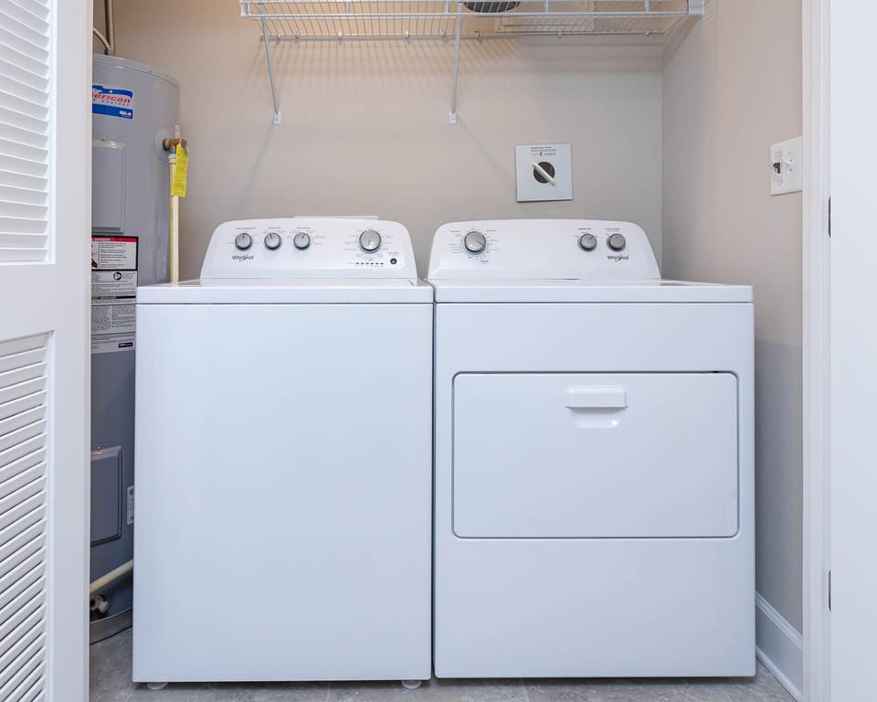 Easily freshen up your beach attire with the convenient washer and dryer, keeping you ready for coastal adventures