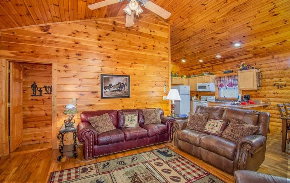 Large queen-size pullout sleeper sofa and recliner in the living room. 