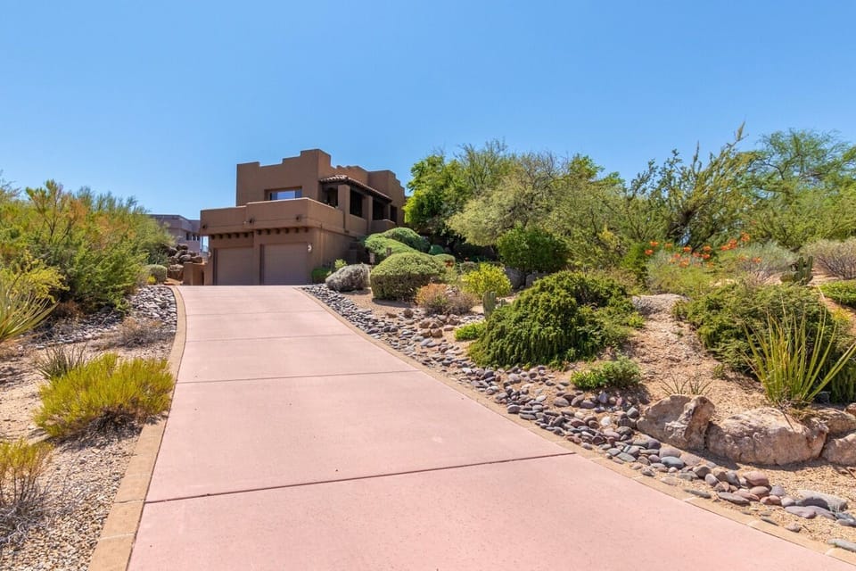 Nice long driveway up to the house providing privacy and amazing views up high. 