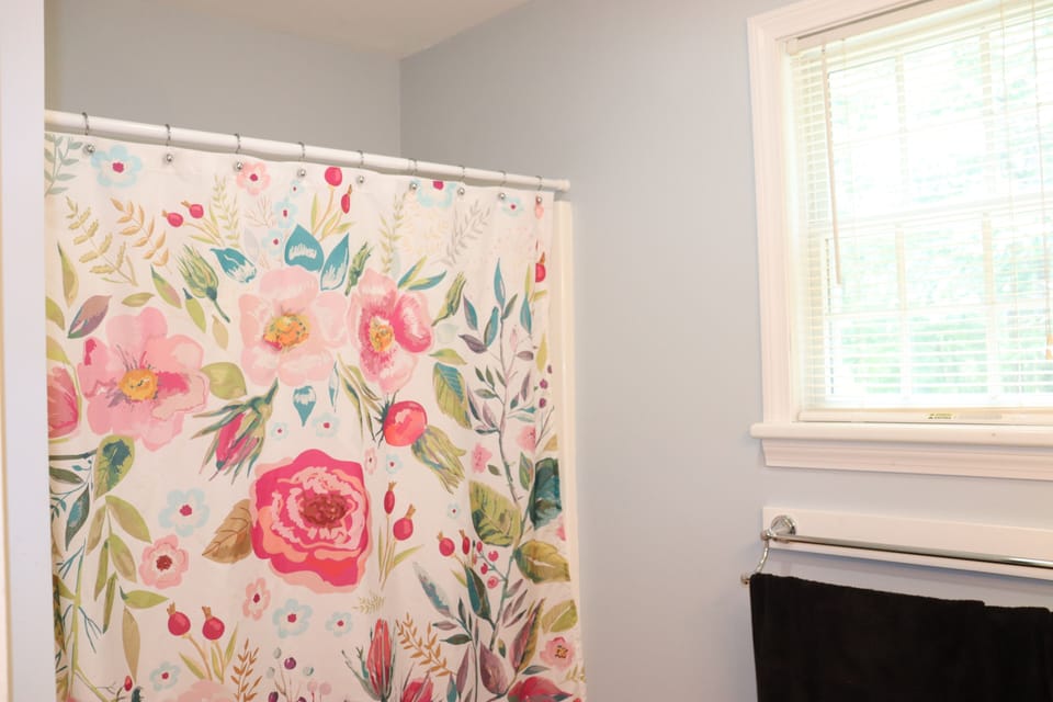 2nd floor full bath with double sink & shower/ tub