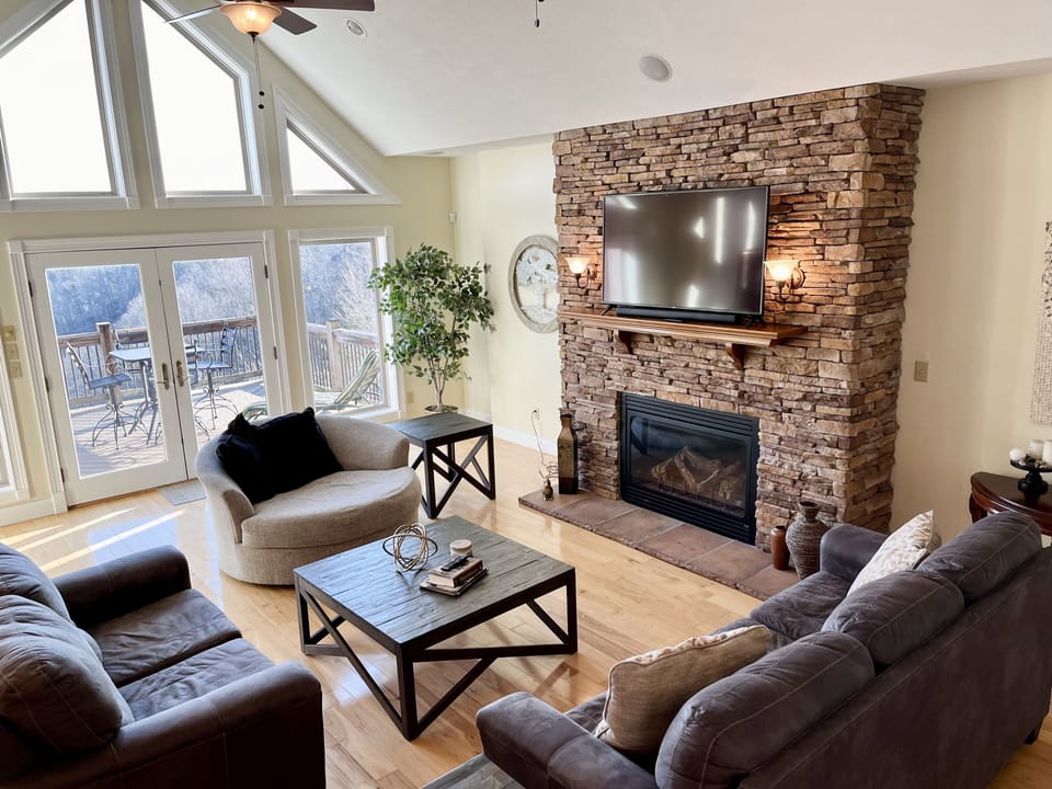 Beautiful open floorplan vaulted ceiling lake view great room.  