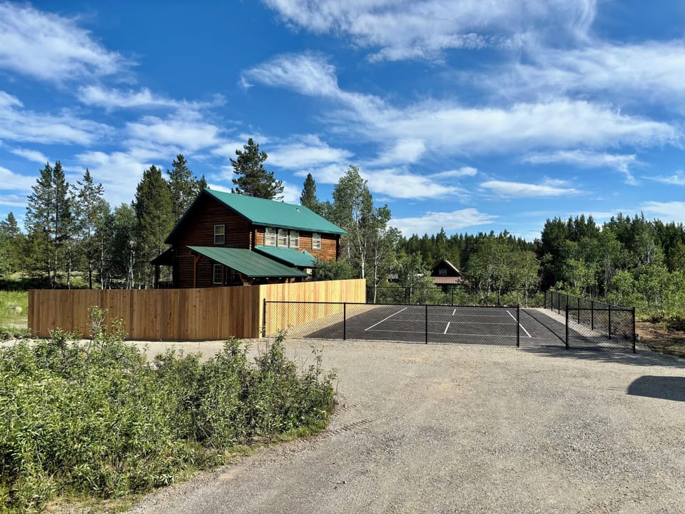 Pickleball court. Fenced.  