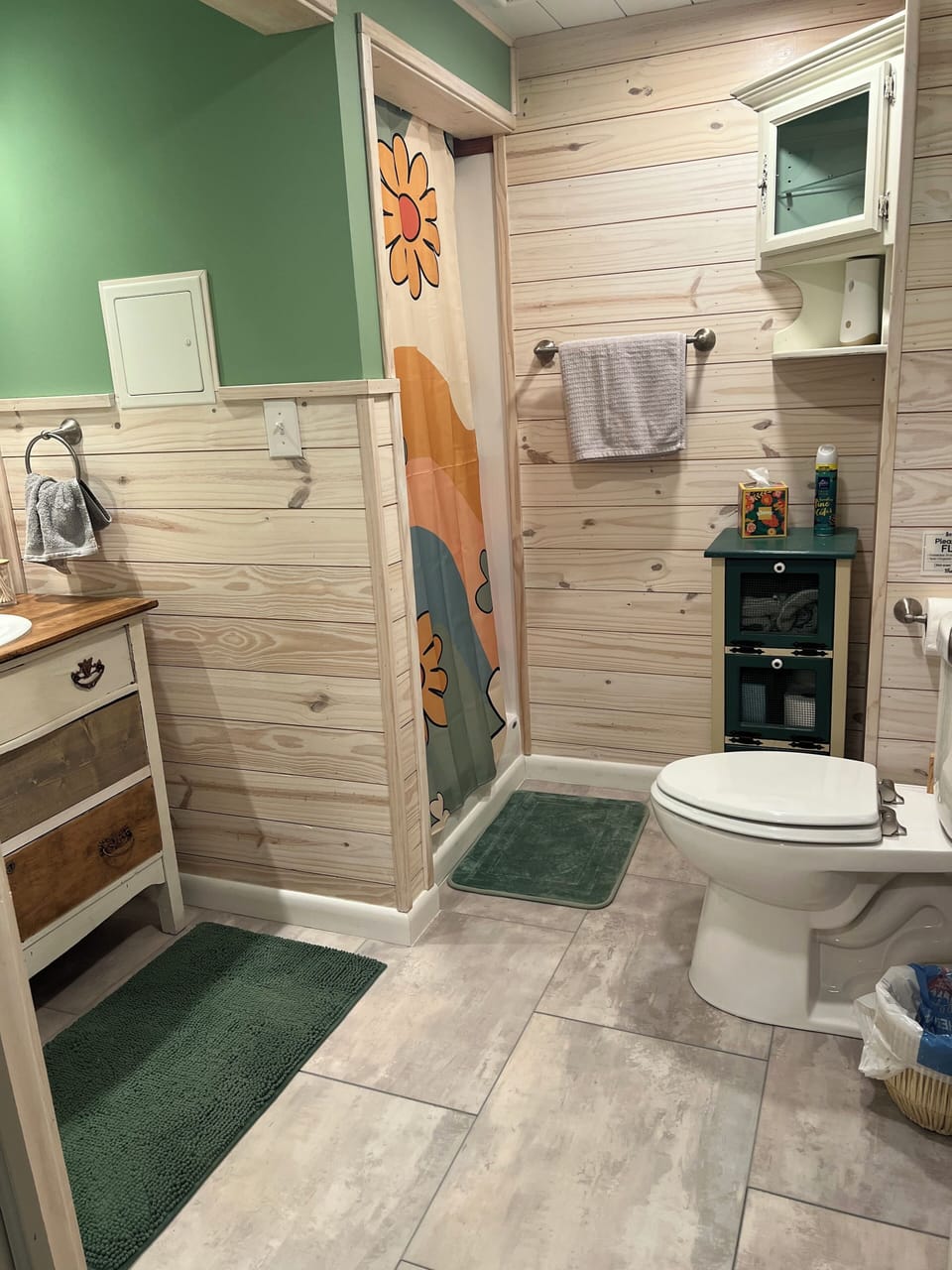 Downstairs bathroom with shower.