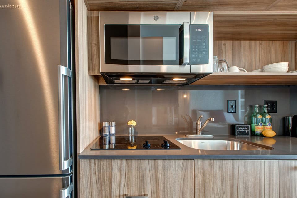 Kitchenette with 2-Burner Electric Stovetop, Refrigerator, Microwave and Dishwasher