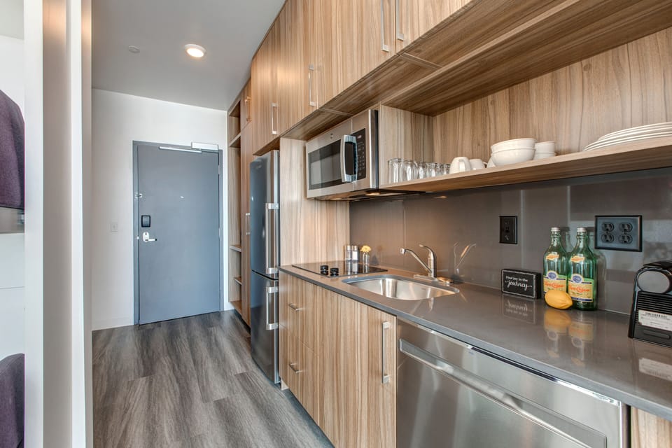 Well Equipped Kitchenette with a Coffee Maker and Cooking Utensils