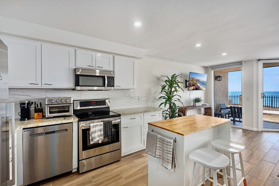 Fully remodeled kitchen with stainless steel appliances