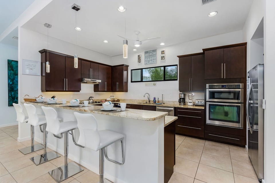 The kitchen is fully equipped & has additional seating for 4 at the breakfast bar