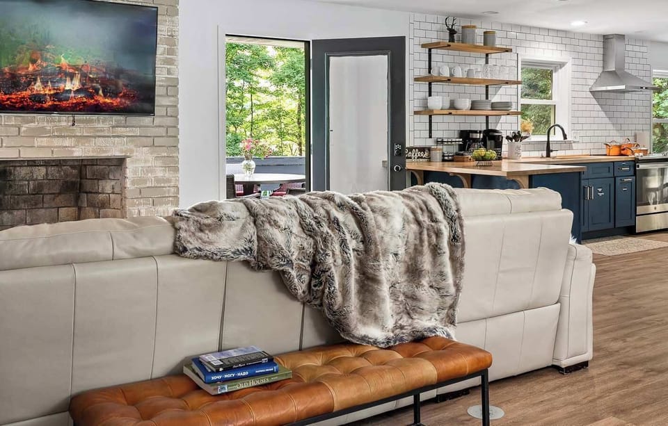 Watch the tree canopy through the windows as light shifts and evening settles in — inside and outside feel beautifully connected at The Gathering Grove.
